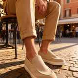 Beige suede loafers, side view with tan insole and low white outsole