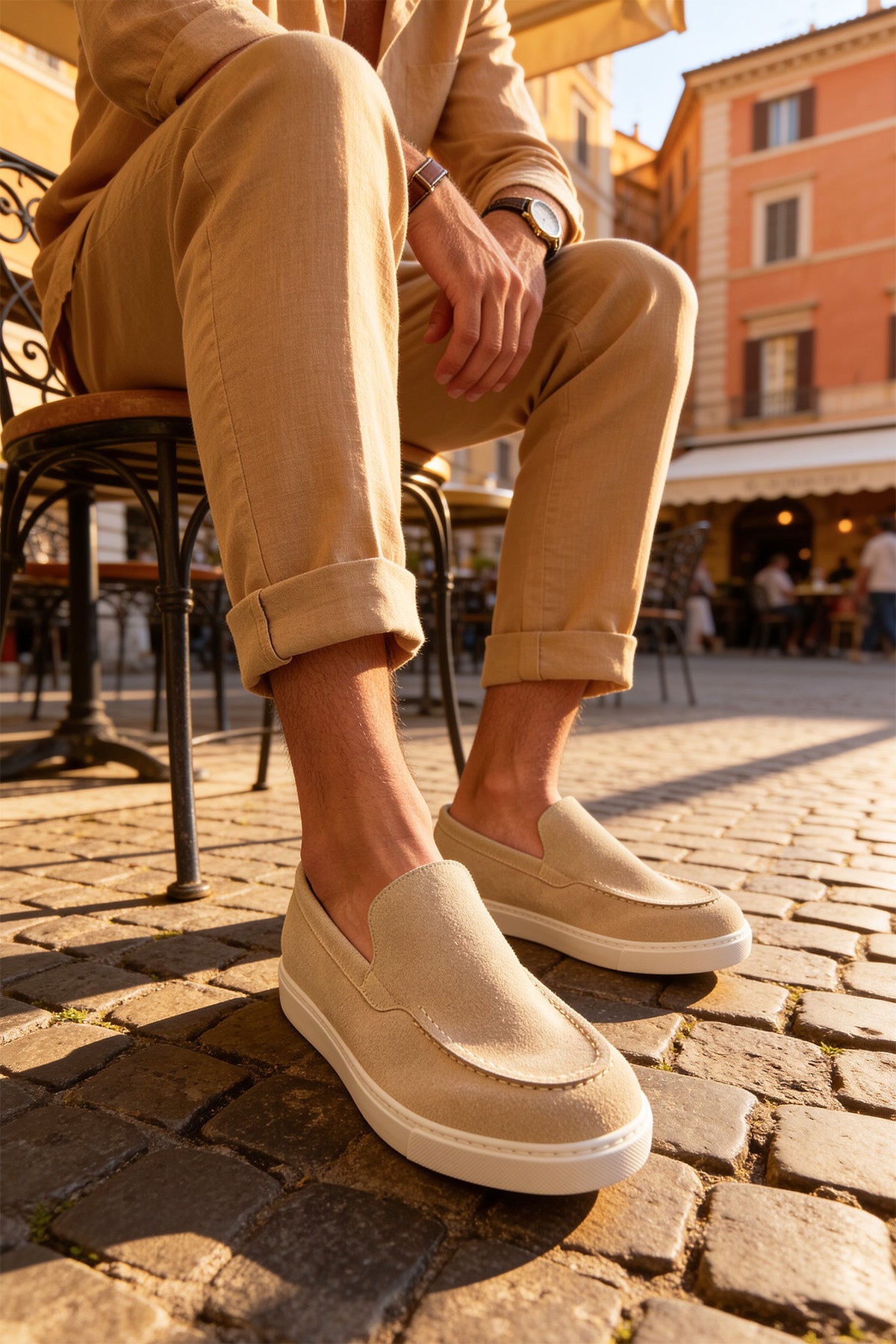 Beige suede loafers, side view with tan insole and low white outsole