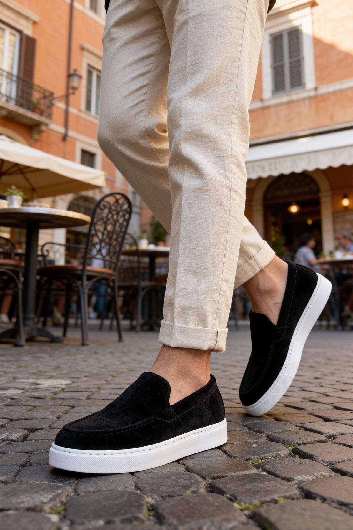 Black suede loafers with white rubber sole, low profile slip-on