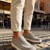 Men's gray suede loafers, textured upper with moc-toe stitching and white cupsole