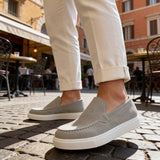 Men's gray suede loafers, slip-on style with side vamp and white rubber sole