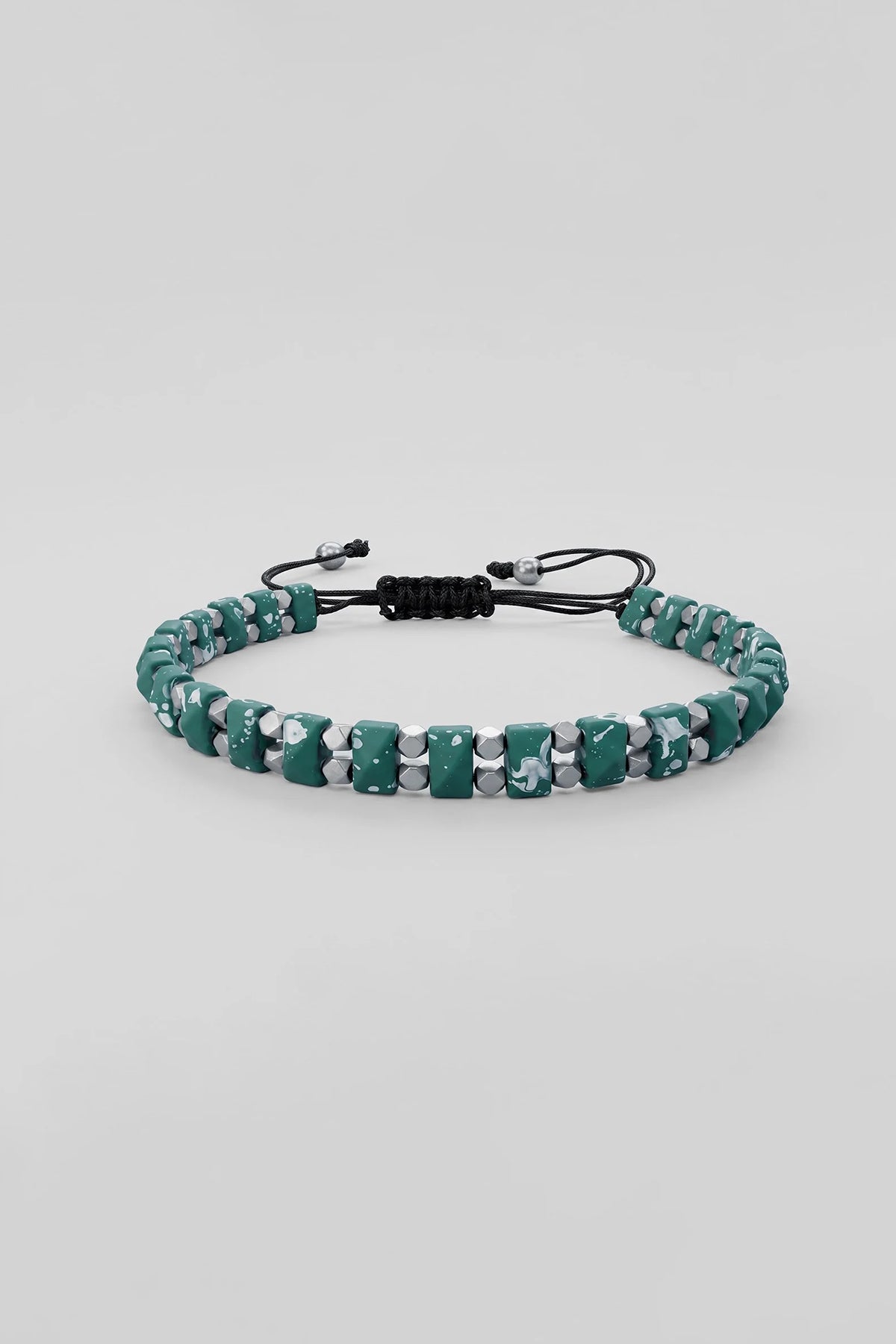 Turquoise stone-look beaded bracelet with black cord and sliding clasp