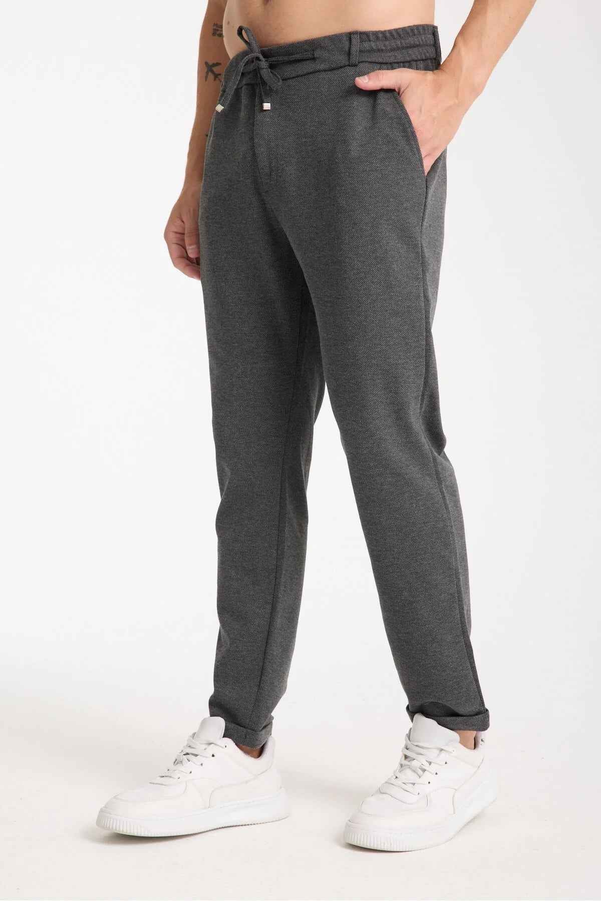 Anthracite sweatpants with drawstring waist and slanted side pockets