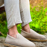 Beige canvas espadrille slip-on shoes with jute rope sole and side stitching