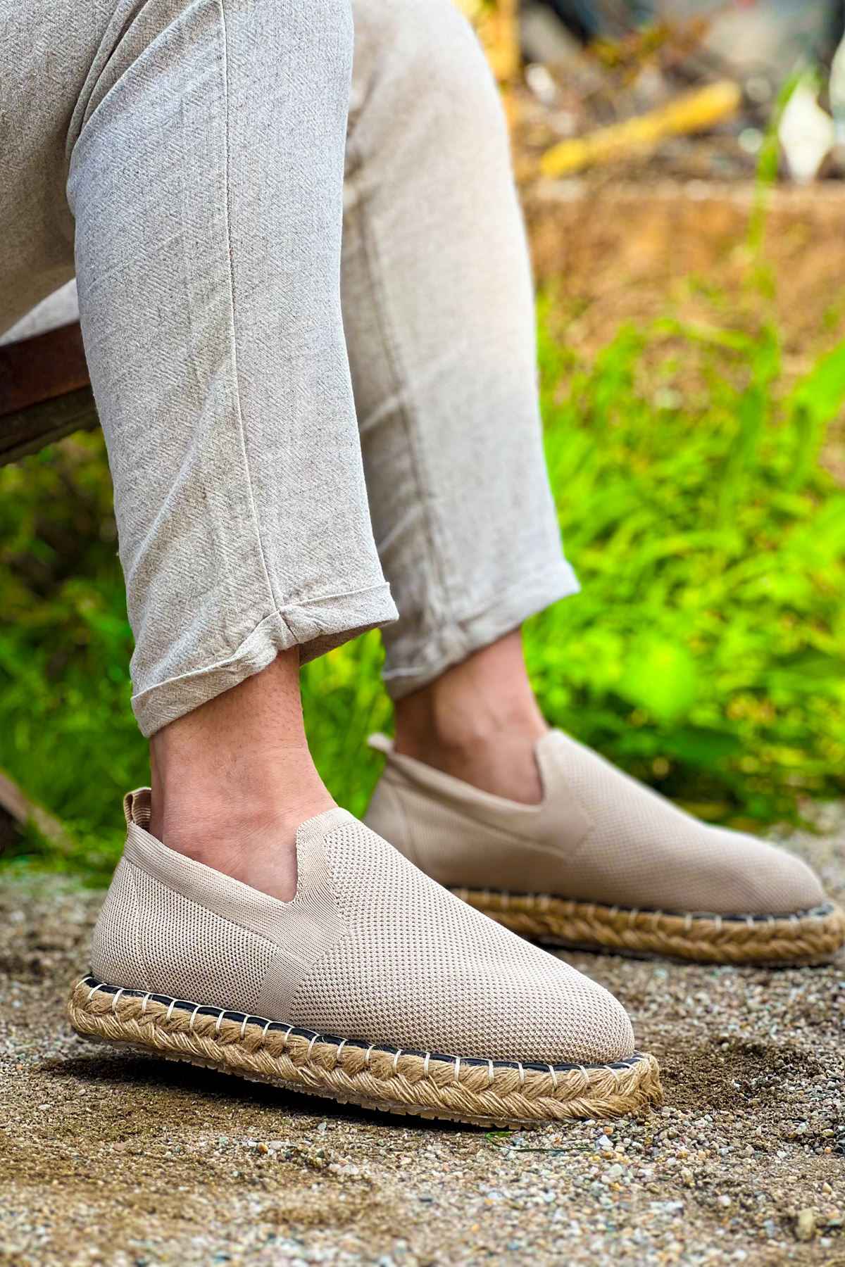 Beige canvas espadrille slip-on shoes with jute rope sole and side stitching