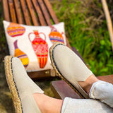 Beige canvas espadrille slip-on shoes, pair shown, jute rope soles