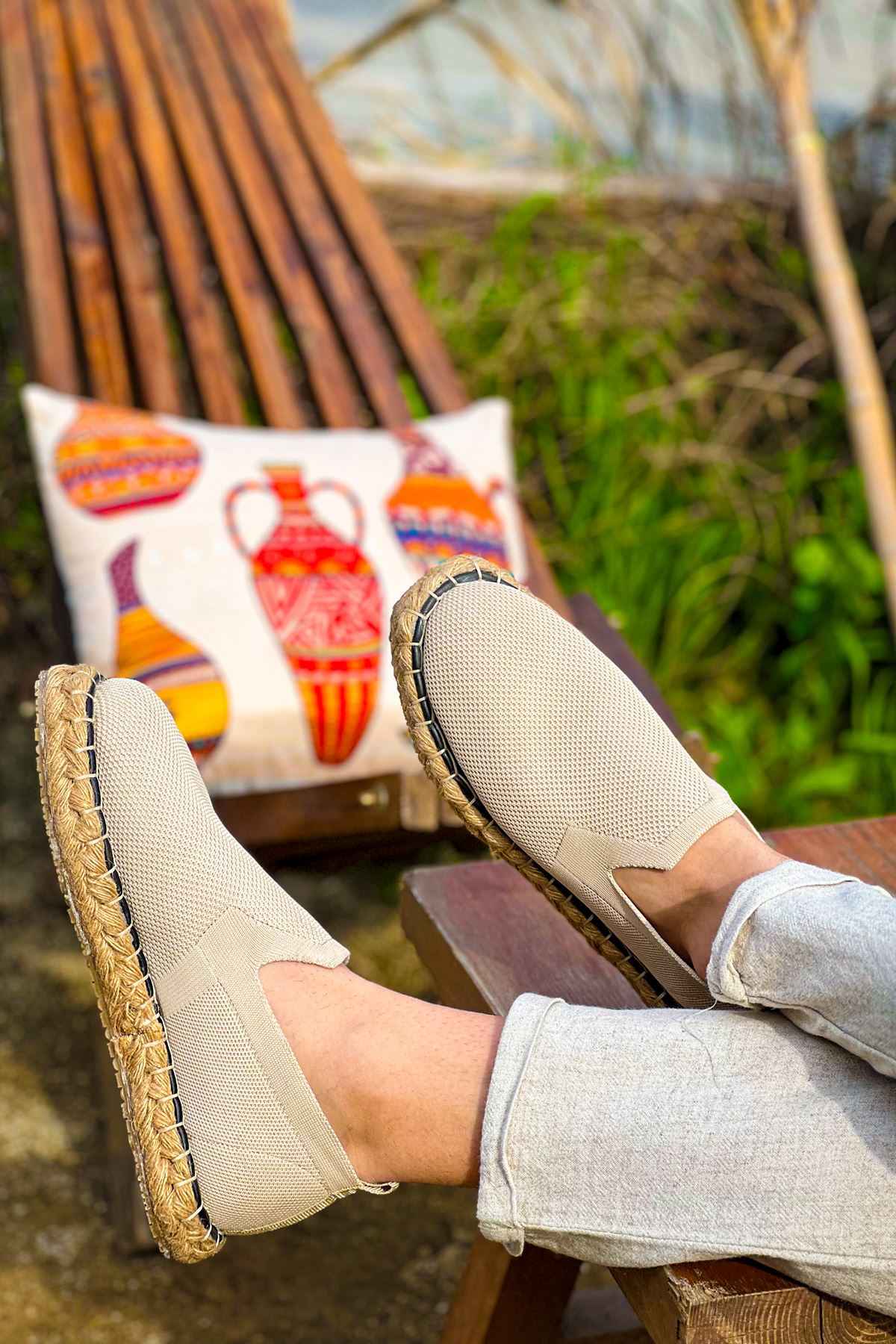 Beige canvas espadrille slip-on shoes, pair shown, jute rope soles
