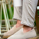 Beige canvas espadrille slip-on shoes with jute rope sole and stitched toe