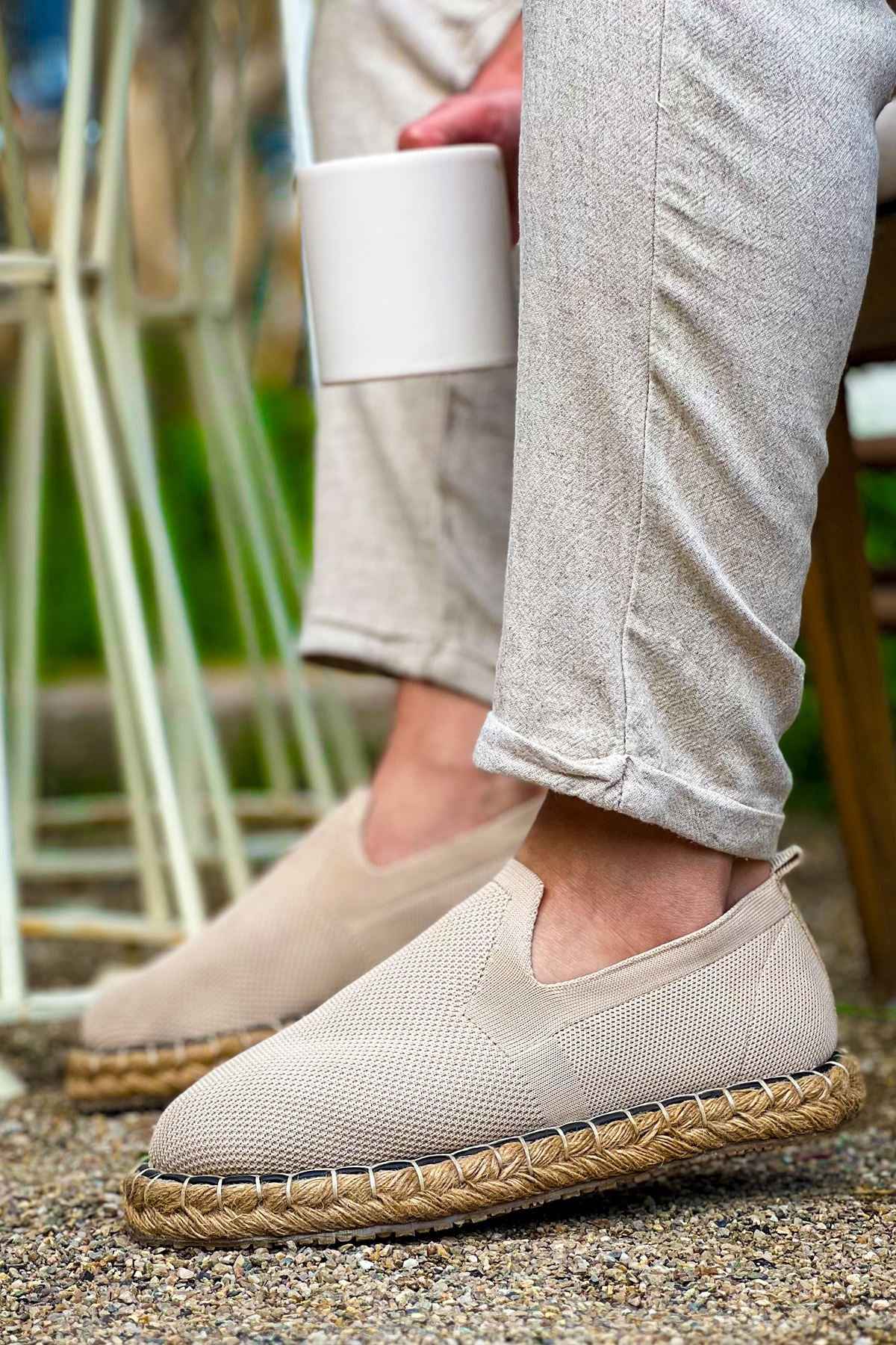 Beige canvas espadrille slip-on shoes with jute rope sole and stitched toe