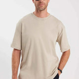 Oversize beige T-shirt with crew neck and short sleeves