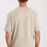 Oversize beige T-shirt, crew neck and short sleeves (back view)