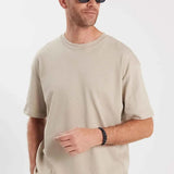 Oversize beige T-shirt with crew neck and short sleeves, drape detail