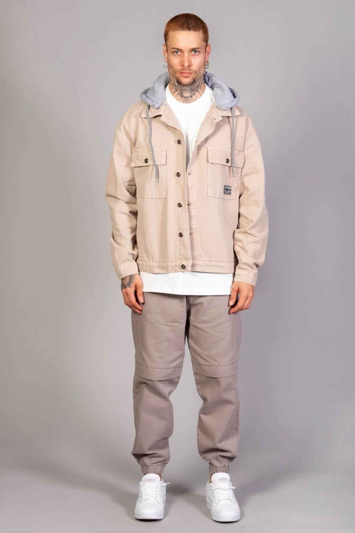 Beige oversized denim jacket with hood, snap front and chest pockets, LTC logo patch