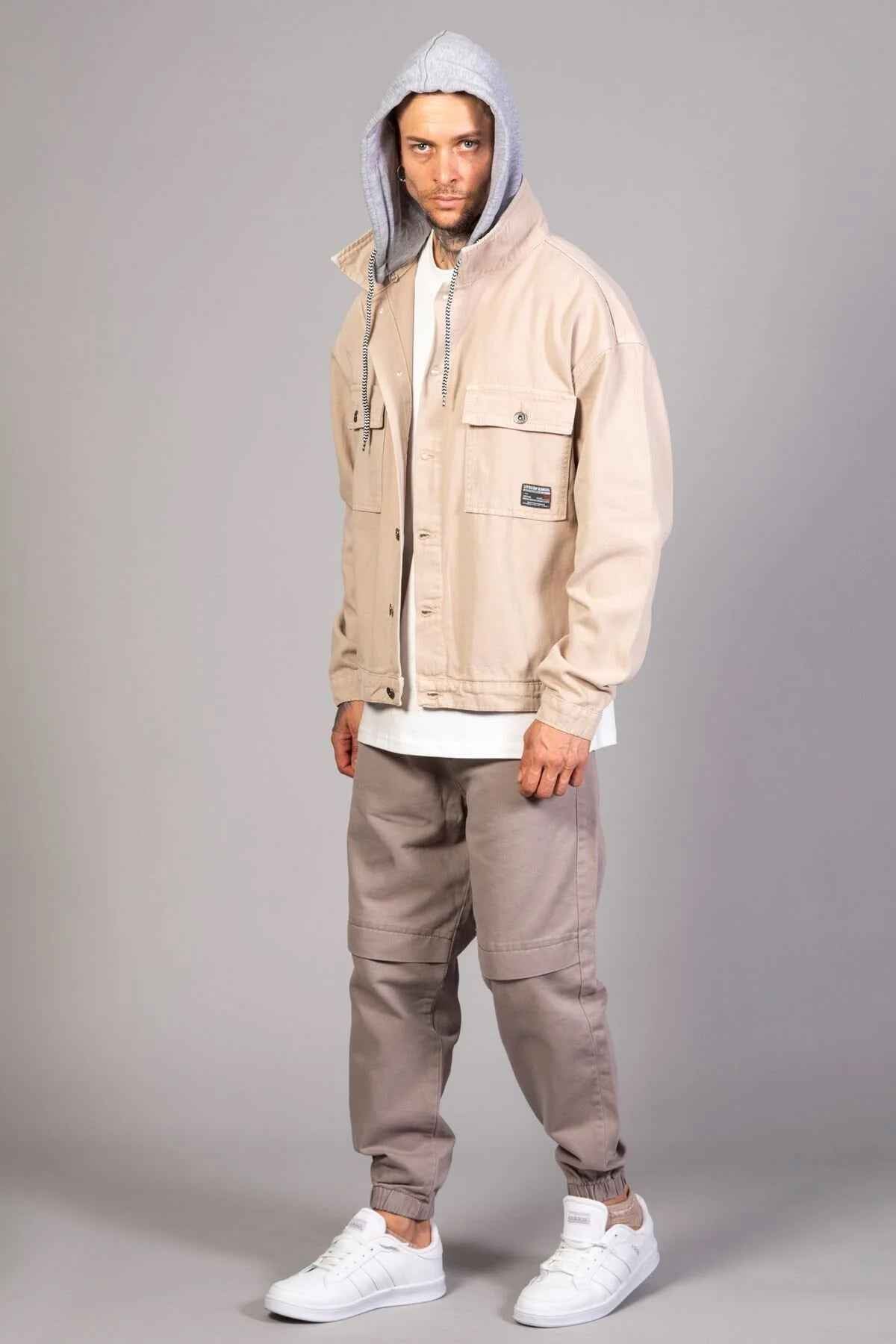 Beige oversized hooded jacket with button front and chest pocket, LTC patch