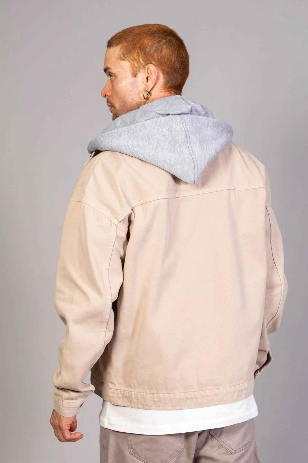 Beige oversized hooded jacket with button back panel and standing collar, LTC patch