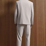 Men's beige oversized suit, back view: blazer and matching trousers