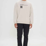 Beige oversized sweatshirt, front view on model
