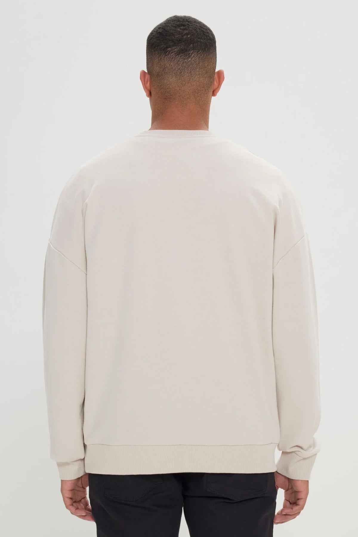 Beige oversized sweatshirt, back view with no print