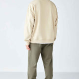 Men's beige oversized sweatshirt back view with crew neck; ribbed cuffs and hem, Stephan