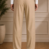 Men's beige tailored pants with black belt, straight legs, front view