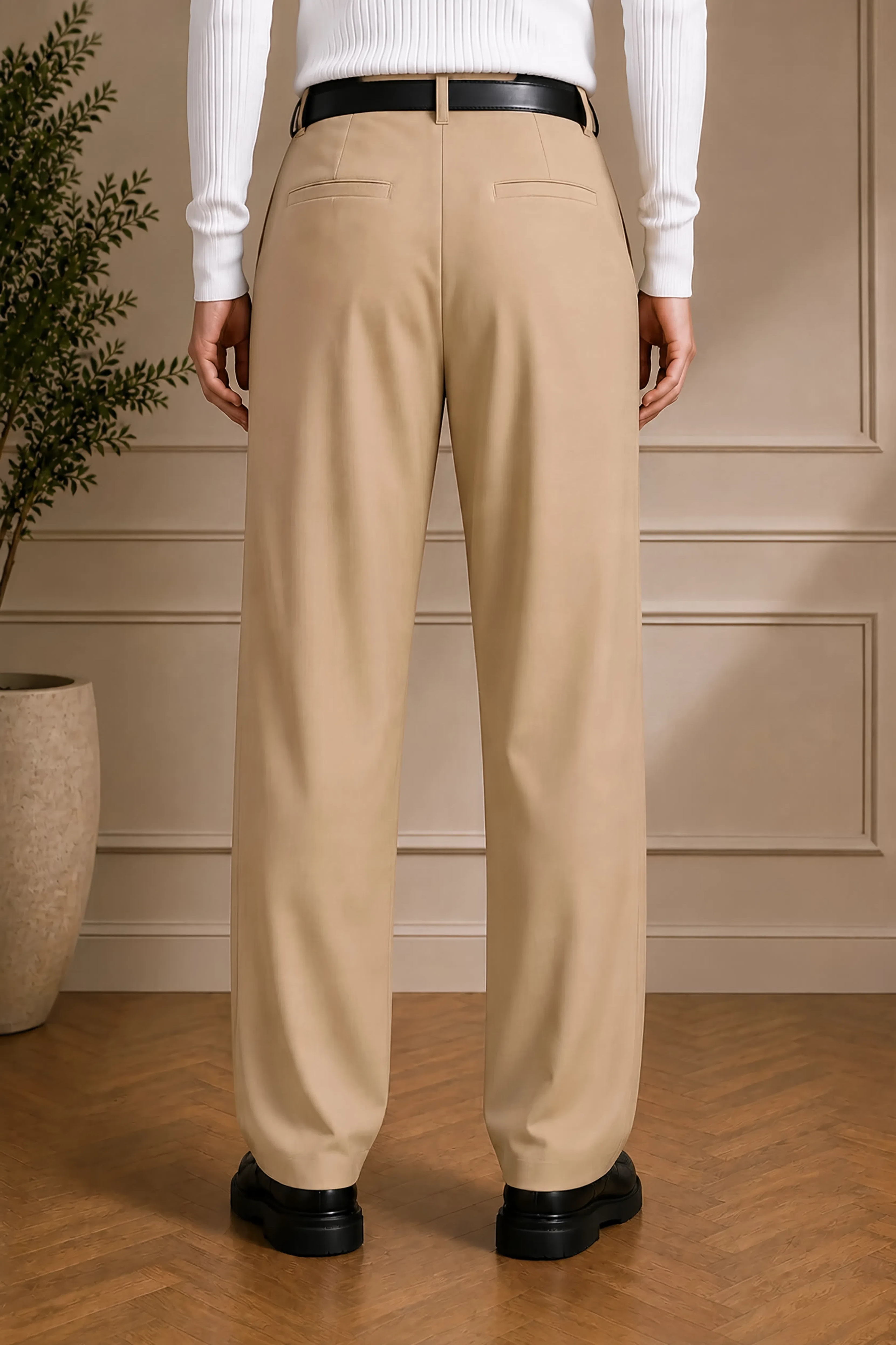 Men's beige tailored pants with black belt, straight legs, front view