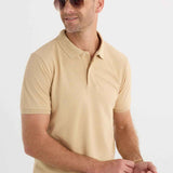 Men's beige polo T-shirt with short sleeves, button placket, and fold-over collar