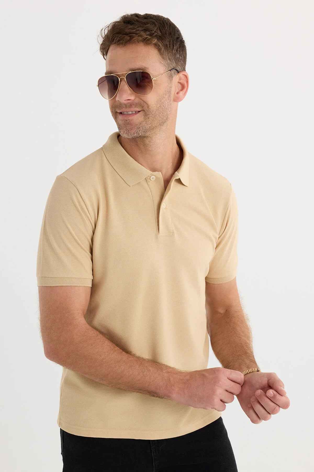 Men's beige polo T-shirt with short sleeves, button placket, and fold-over collar
