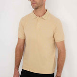 Men's beige polo T-shirt with short sleeves and fold-over collar with buttons