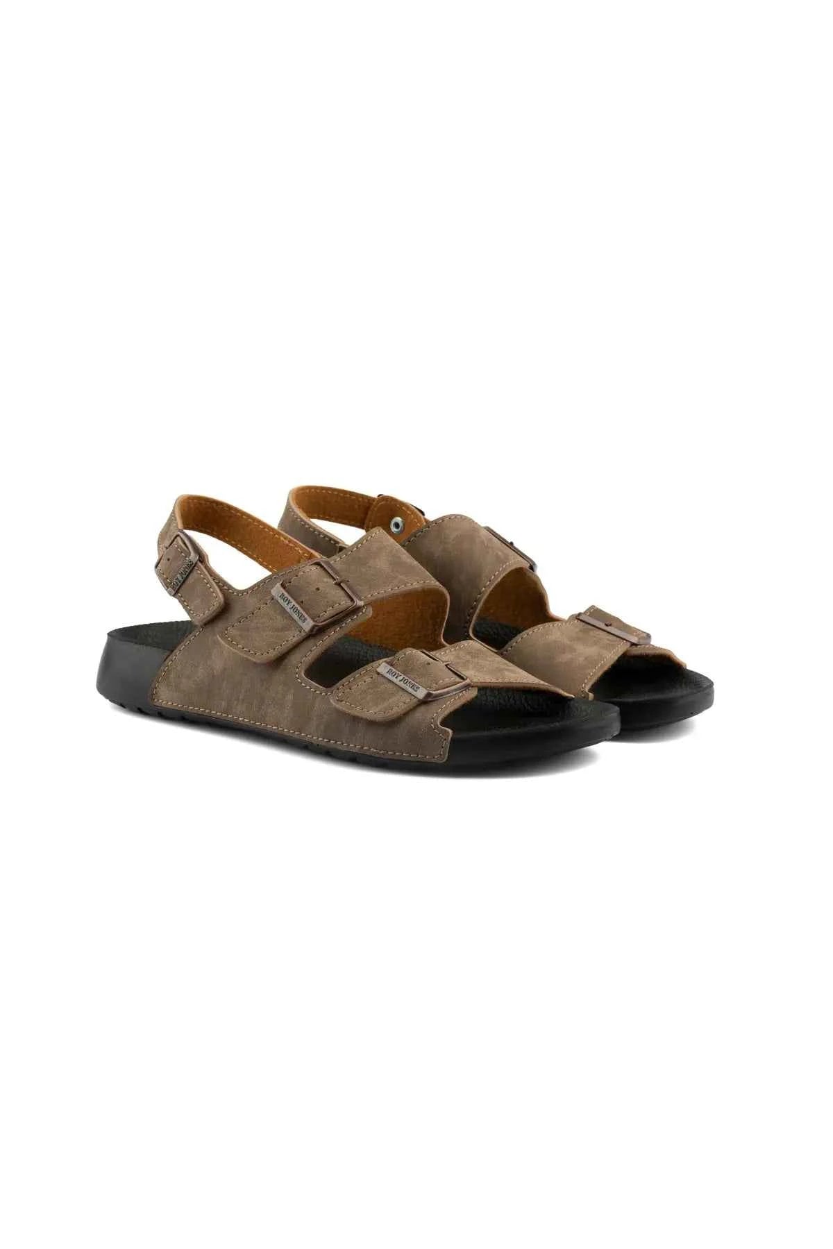 Pair of men's brown suede sandals with three adjustable straps and flat sole