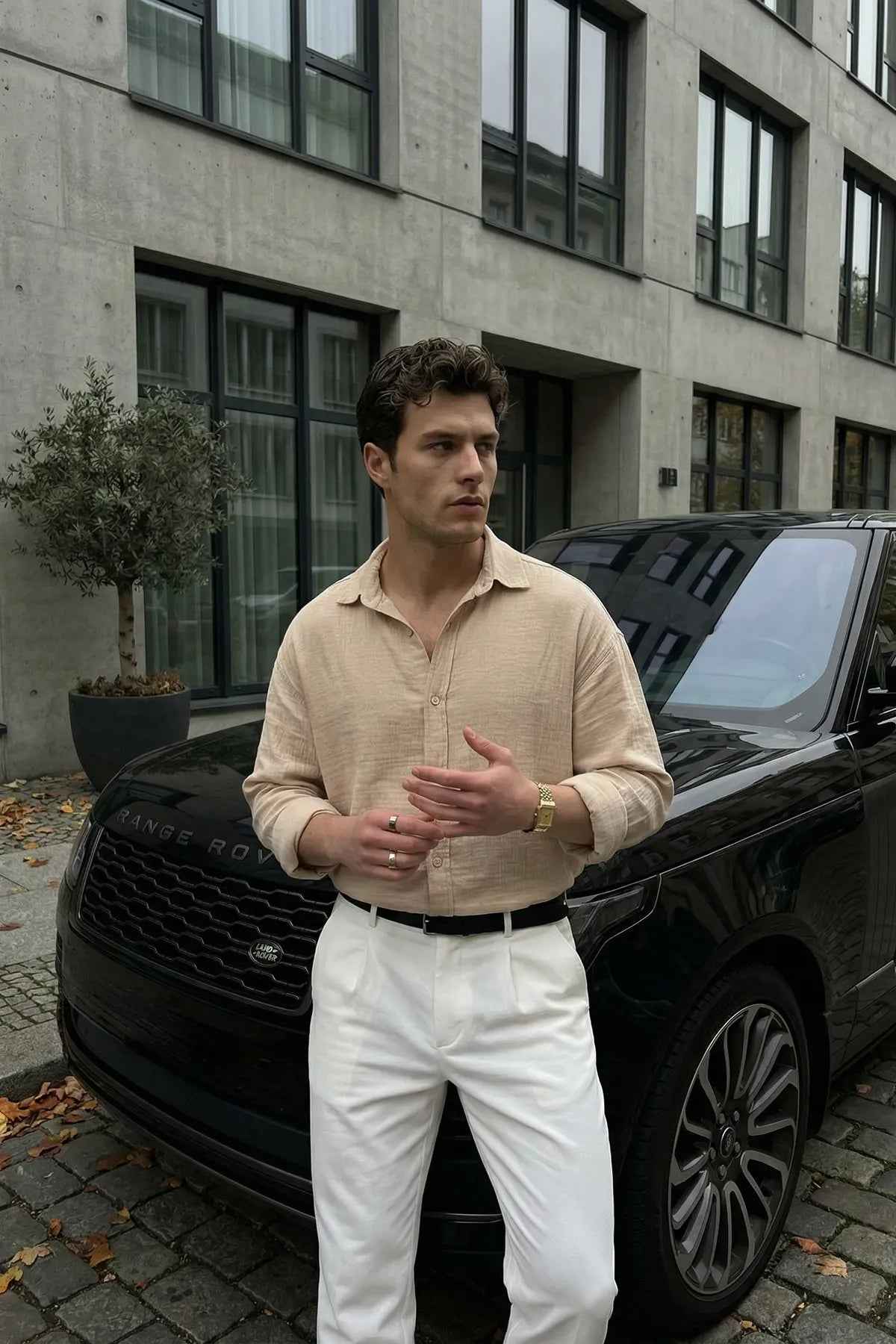 Men's LV beige button-up shirt with collar, long sleeves, and front button placket