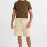 Men's light beige shorts with straight hem, drawstring waistband and side pockets