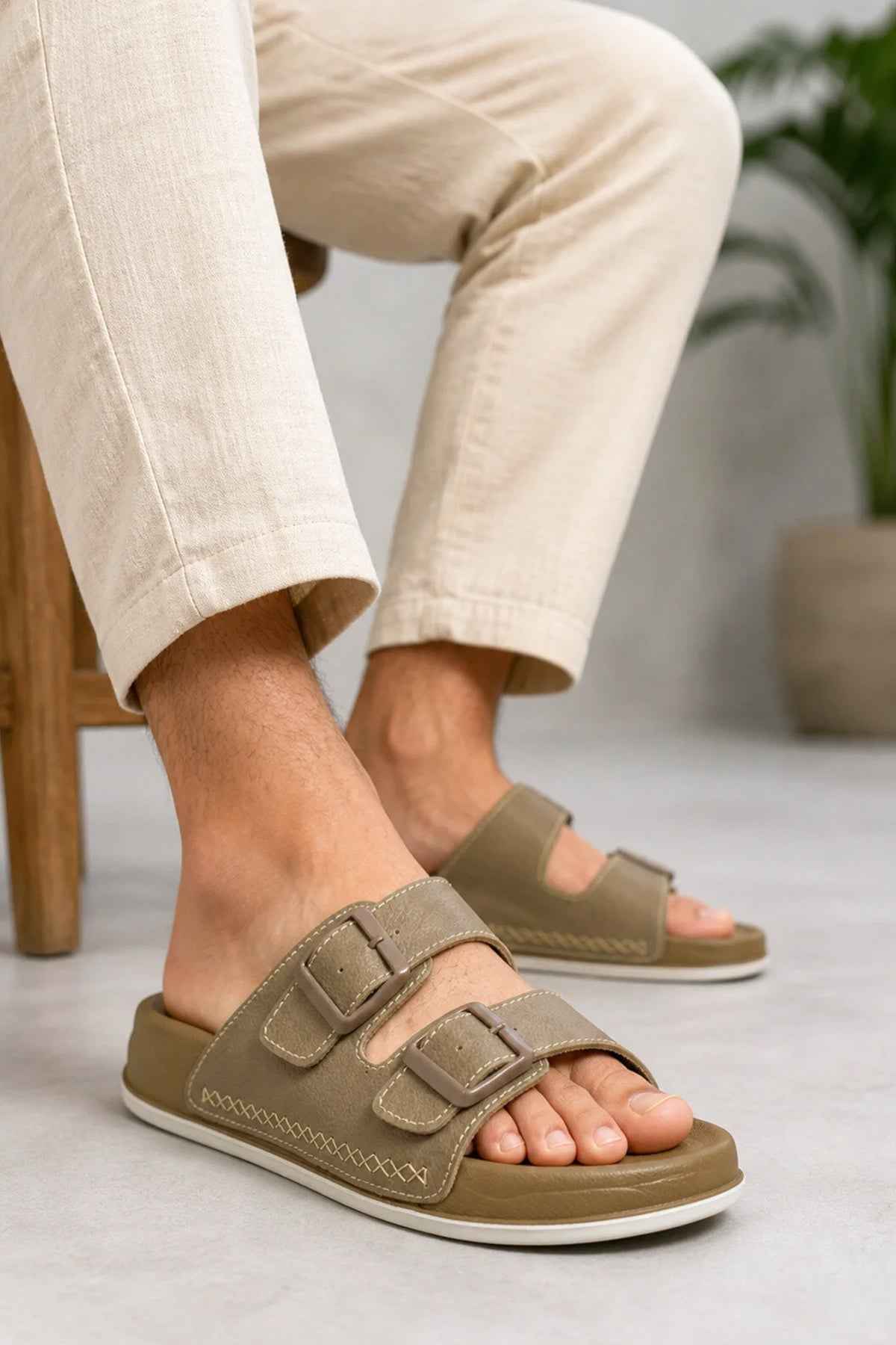 Men's beige open-toe slide slippers, side view with two wide straps