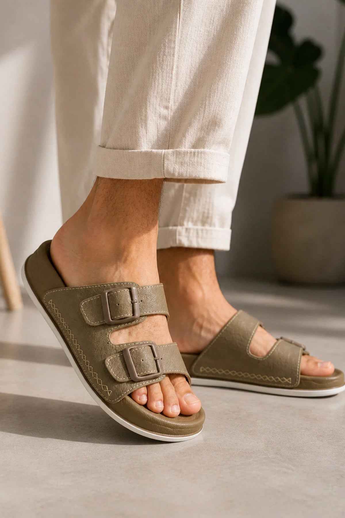 Men's beige open-toe slippers with two straps and cushioned sole, front angle