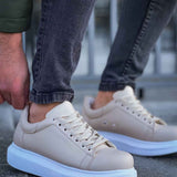 Men's Apollo beige sneakers, close front view with white laces