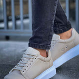 Men's Apollo beige sneakers, angled side view with white laces and light sole