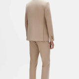 Beige striped men’s suit trousers and blazer set, back view.
