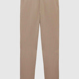 Beige striped men’s suit trousers with belt loops and buttoned waist closure.