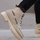 Beige suede men’s lace-up boots with thick sole and stitched side panels