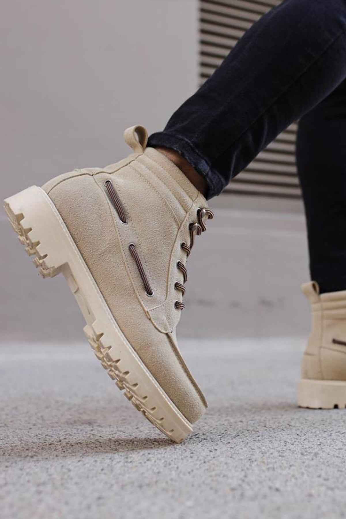 Beige suede men’s lace-up boots with thick sole and stitched side panels