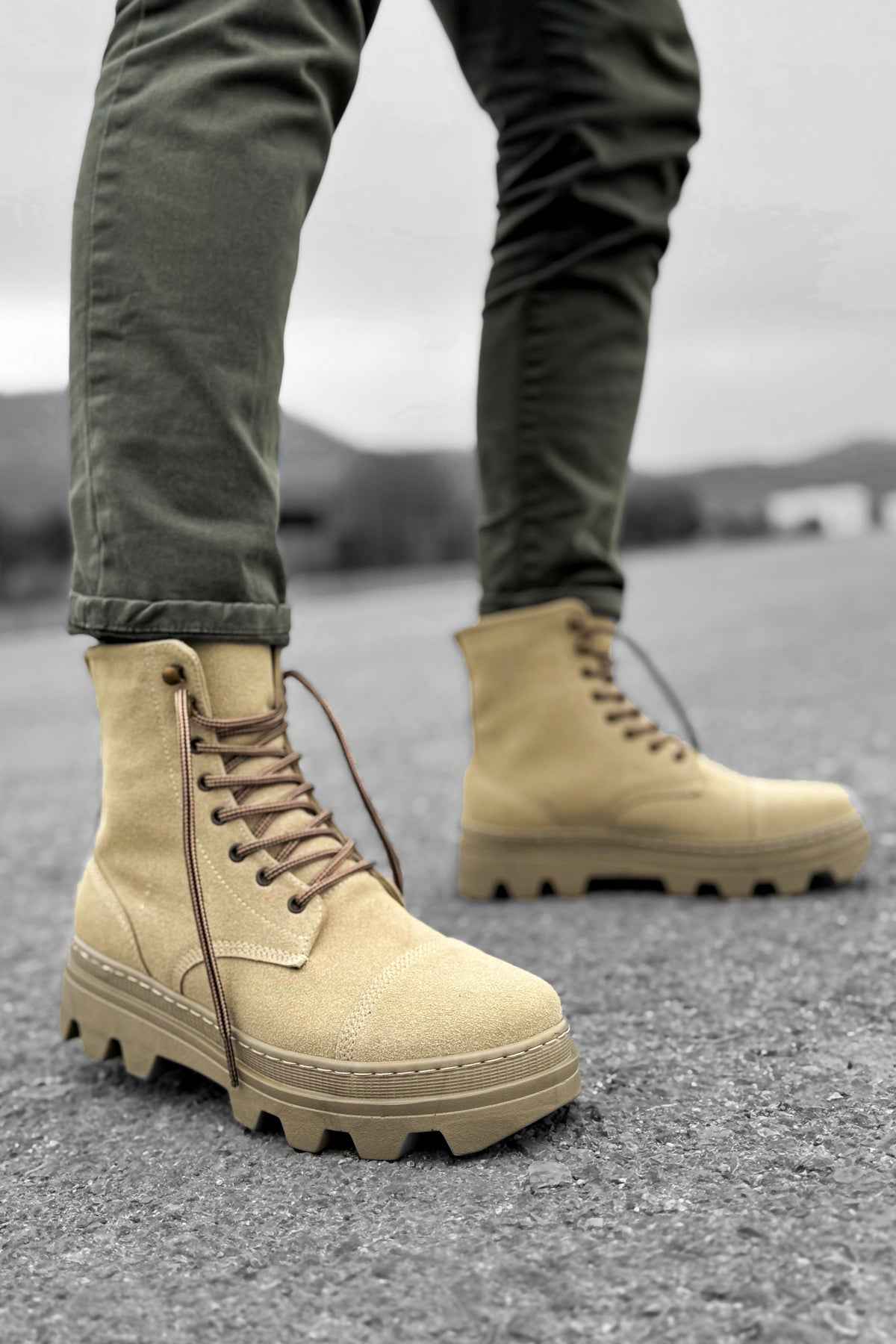 Men's beige suede lace-up boots with round toe and lug sole