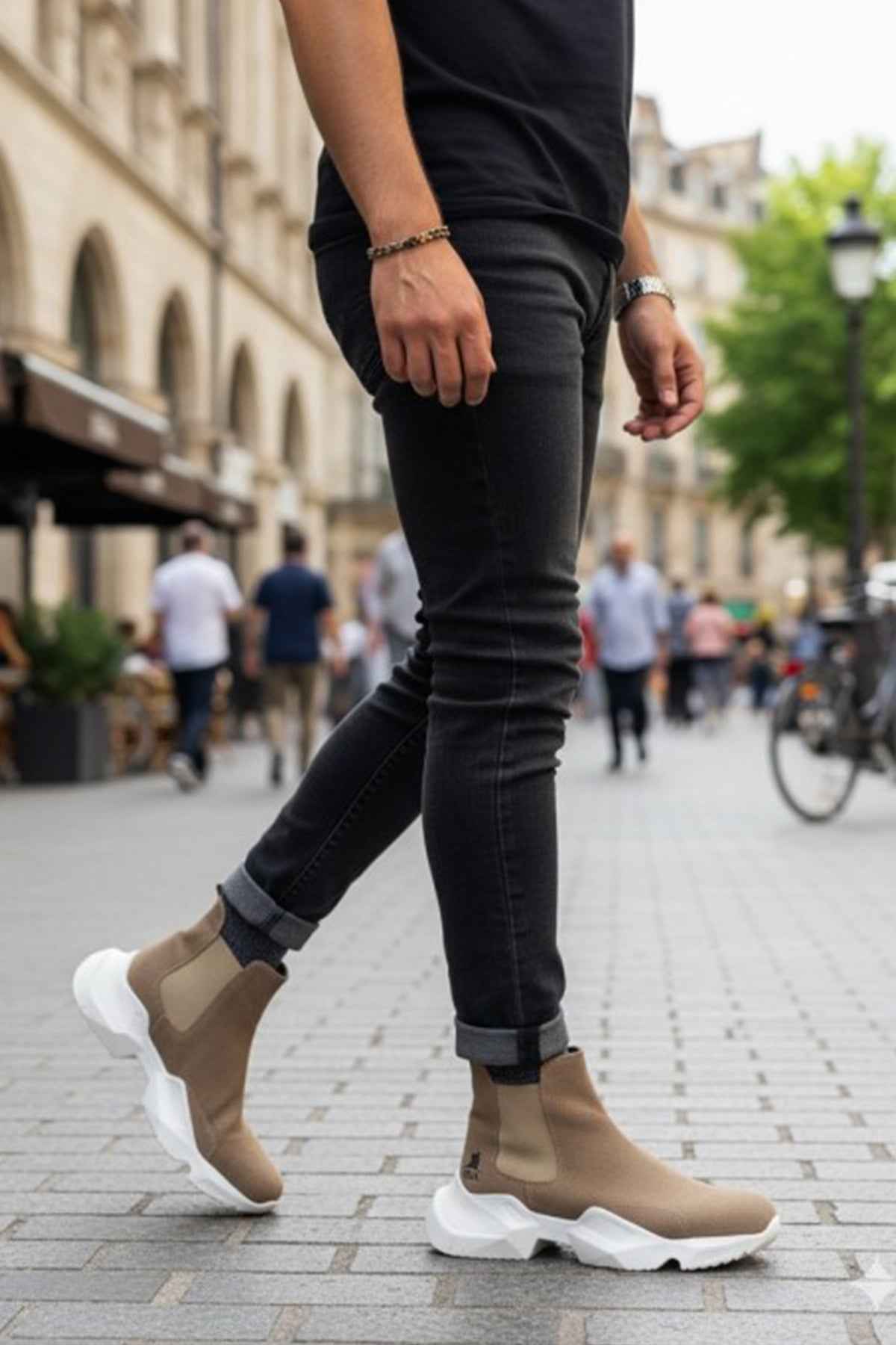 Men's beige suede ankle boots, white sole, worn with dark jeans