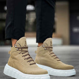 Beige suede high-top boots with lace-up front and heel tab, white platform sole