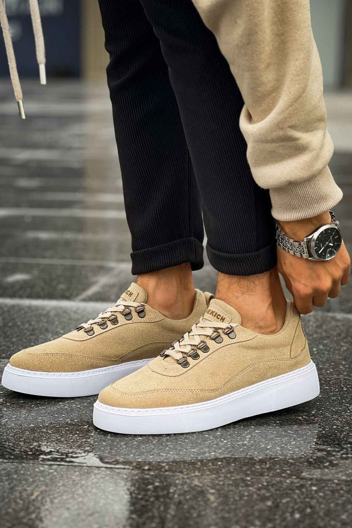 Beige suede lace-up sneakers with white rubber sole, side view
