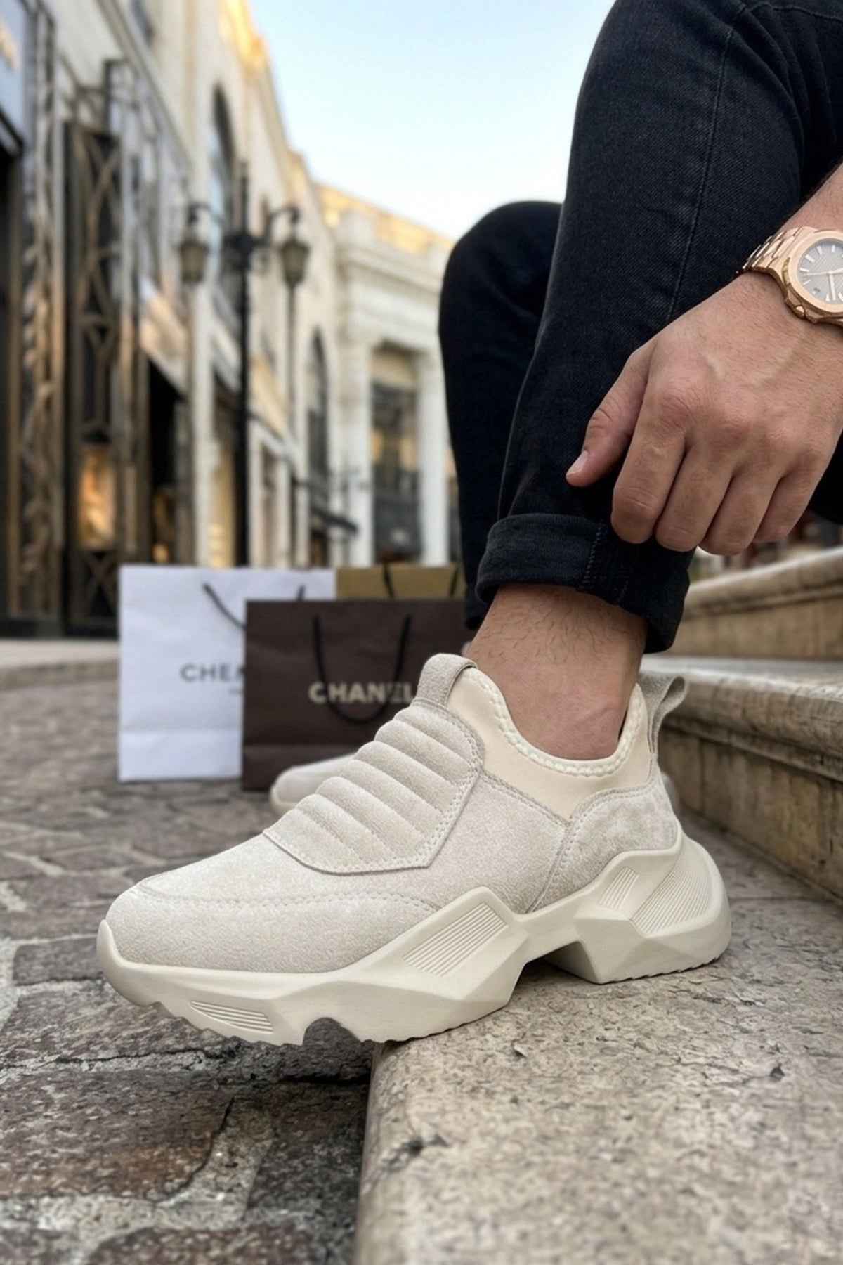 Beige suede sneakers with elastic collar and chunky white platform sole