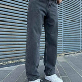 Men's baggy dark jeans, relaxed straight legs with cuffed ankle hem