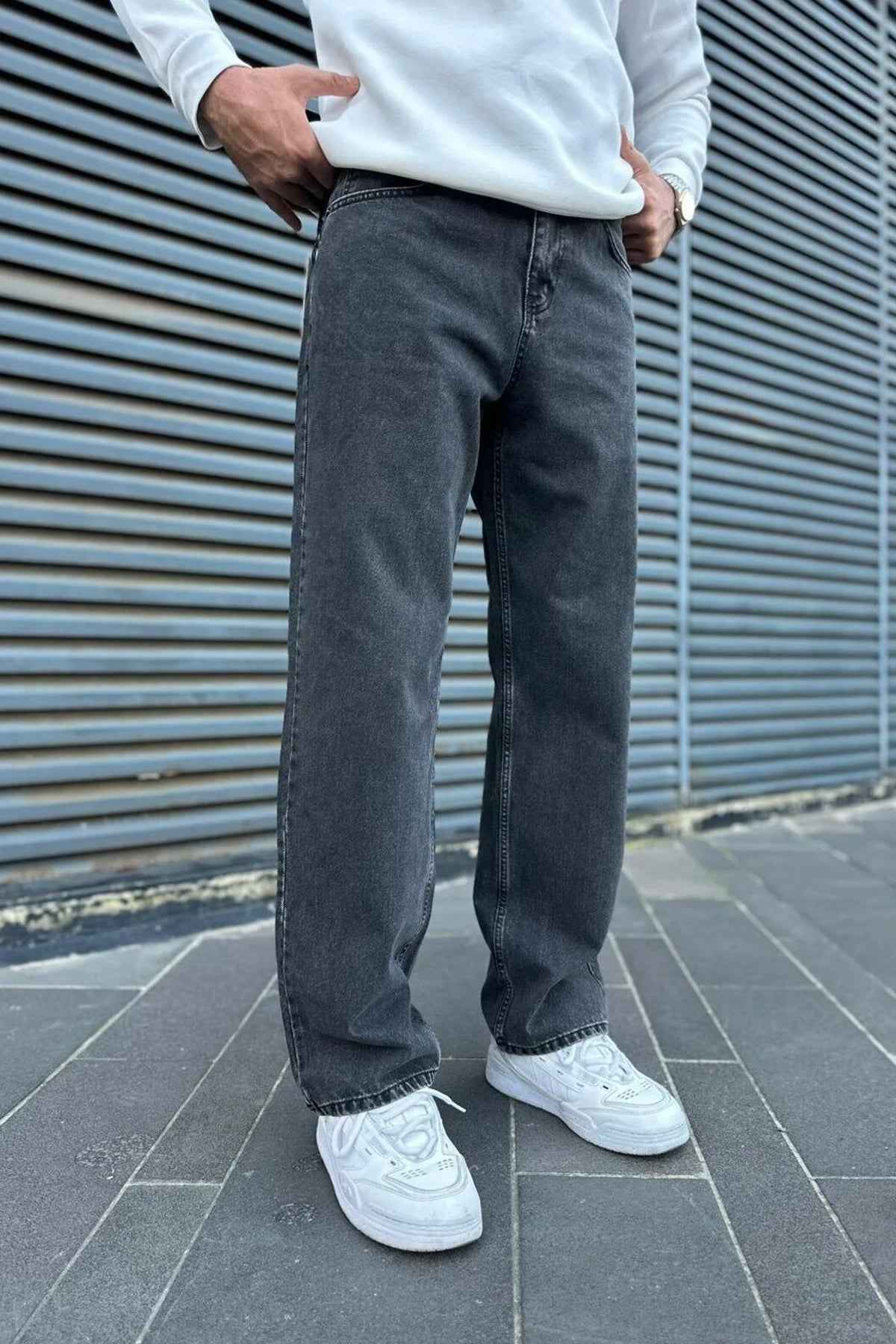 Men's baggy dark jeans, relaxed straight legs with cuffed ankle hem