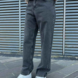 Men's baggy dark jeans with front seam and relaxed fit, cuffed ankle hem