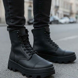 Men's black lace-up mid boots with padded collar and chunky lug tread