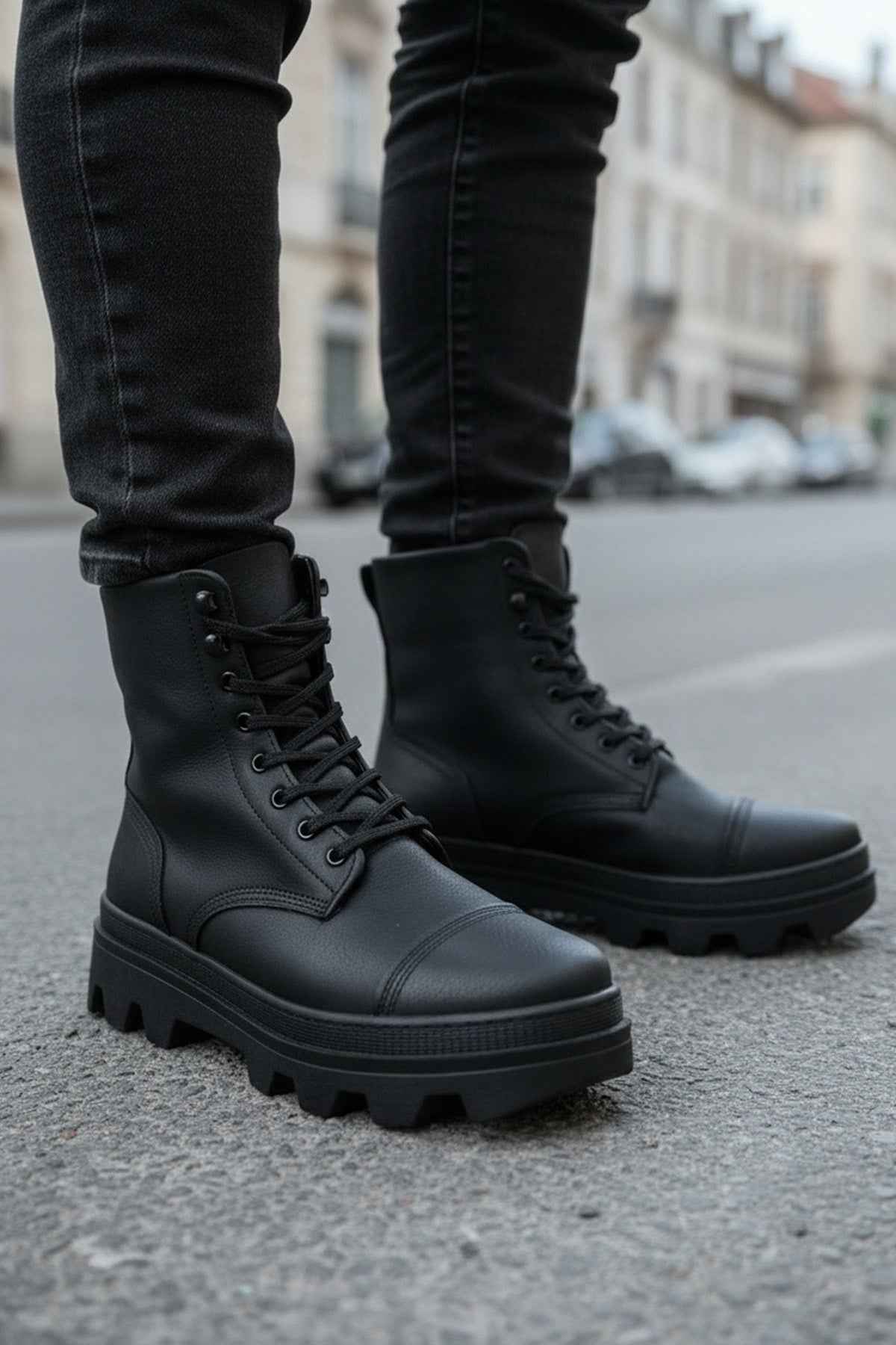 Men's black lace-up mid boots with padded collar and chunky lug tread