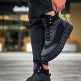 Black lace-up ankle boots with textured sole tread and gray side accents